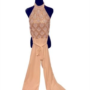 Elegant gold and white sequined jumpsuit size M.